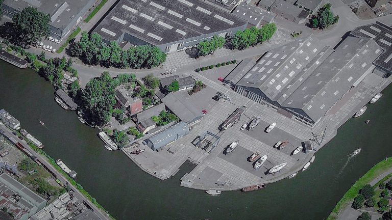 Woningen op plaats van Nautisch Centrum Nicolaas Witsen