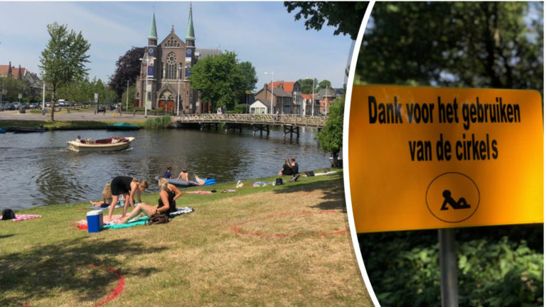 ‘Veilig in je rondje’, rode afstandscirkels op gras Alkmaars Bolwerk gespoten